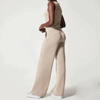Mia - ærmeløs jumpsuit med brede ben og bindebånd i taljen