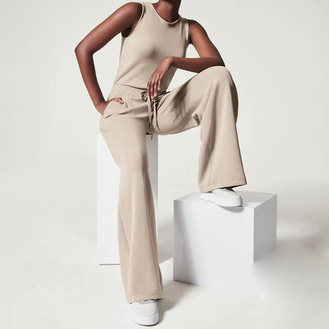 Mia - ærmeløs jumpsuit med brede ben og bindebånd i taljen