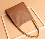 Jula - Ensfarvet crossbody-taske i ægte læder