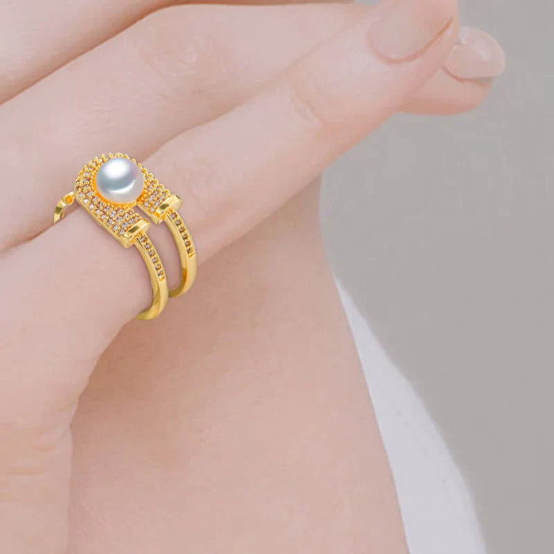 Cassia - split band ring med central perle og pavé indstilling