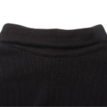 Mia - Asymmetrisk ribstrikket sweater med krave