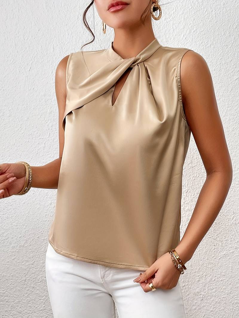 Elegant ærmeløs bluse i satin med snoet halsudskæring til kvinder