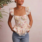 Emilia - blomstret korsettop med blondekant og peplum