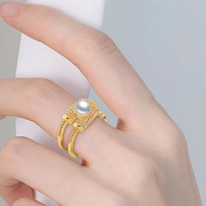 Cassia - split band ring med central perle og pavé indstilling