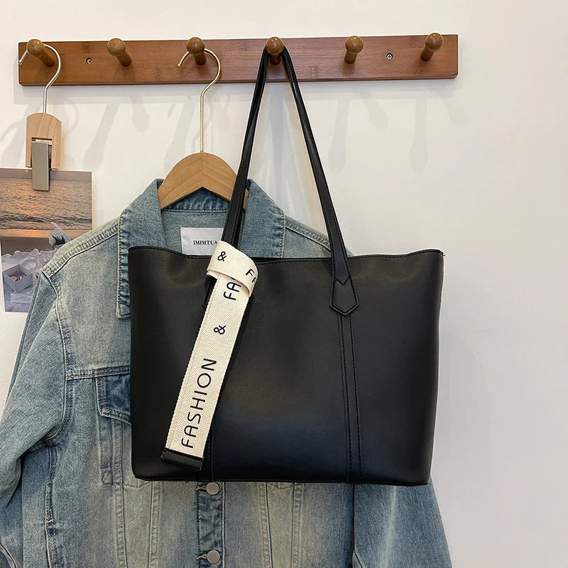 Joy stilfuld sort taske