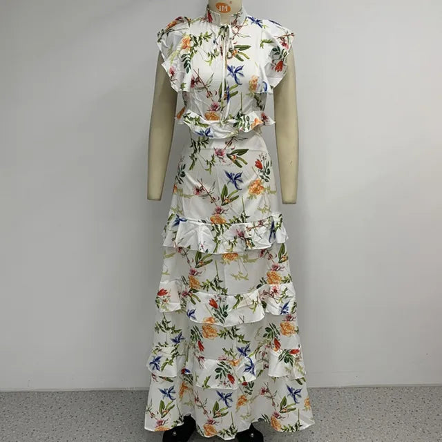 Claire - Elegant maxikjole med blomstermønstre i flere niveauer