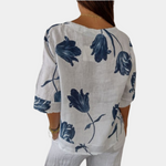 Bluse med tulipaner og blomsterprint med V-hals