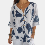 Bluse med tulipaner og blomsterprint med V-hals