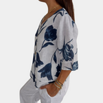 Bluse med tulipaner og blomsterprint med V-hals