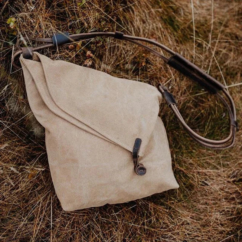 Rostro - Stilfuld skuldertaske i lærred med læderstropper
