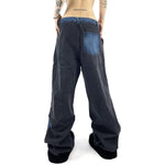 Caspia - Oversized denimbukser med et kontrasterende patchwork-look