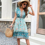 STELLA - Boho midikjole med blomsterprint