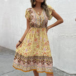 STELLA - Boho midikjole med blomsterprint