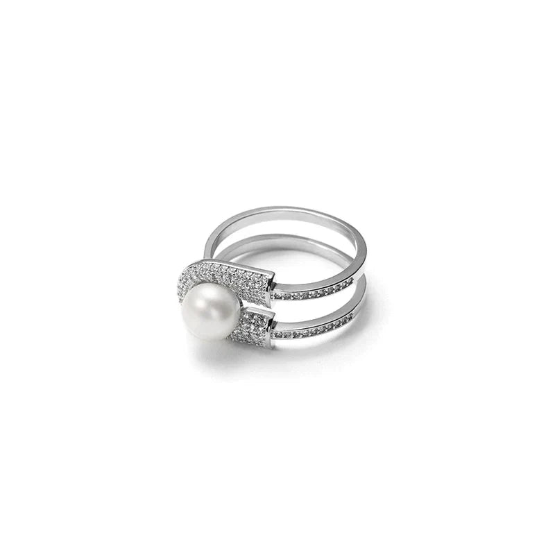 Cassia - split band ring med central perle og pavé indstilling