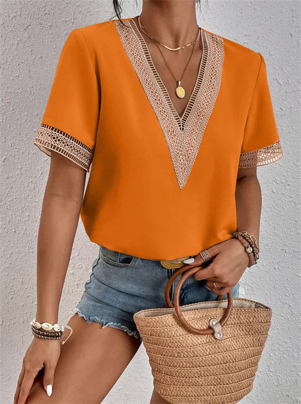 Sommerens elegante bluse med V-hals