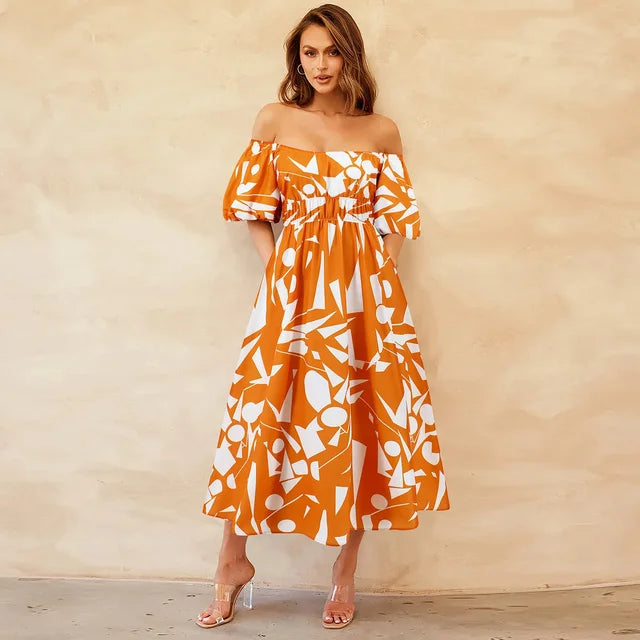Bianca - Livlig off-the-shoulder midikjole med et geometrisk mønster