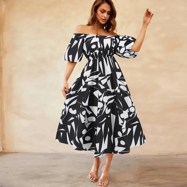 Bianca - Livlig off-the-shoulder midikjole med et geometrisk mønster