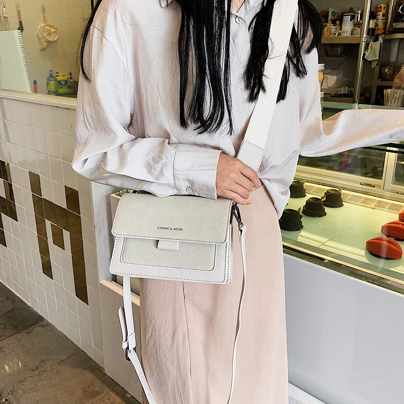 Annelie - Moderigtig skuldertaske med multi-lomme design