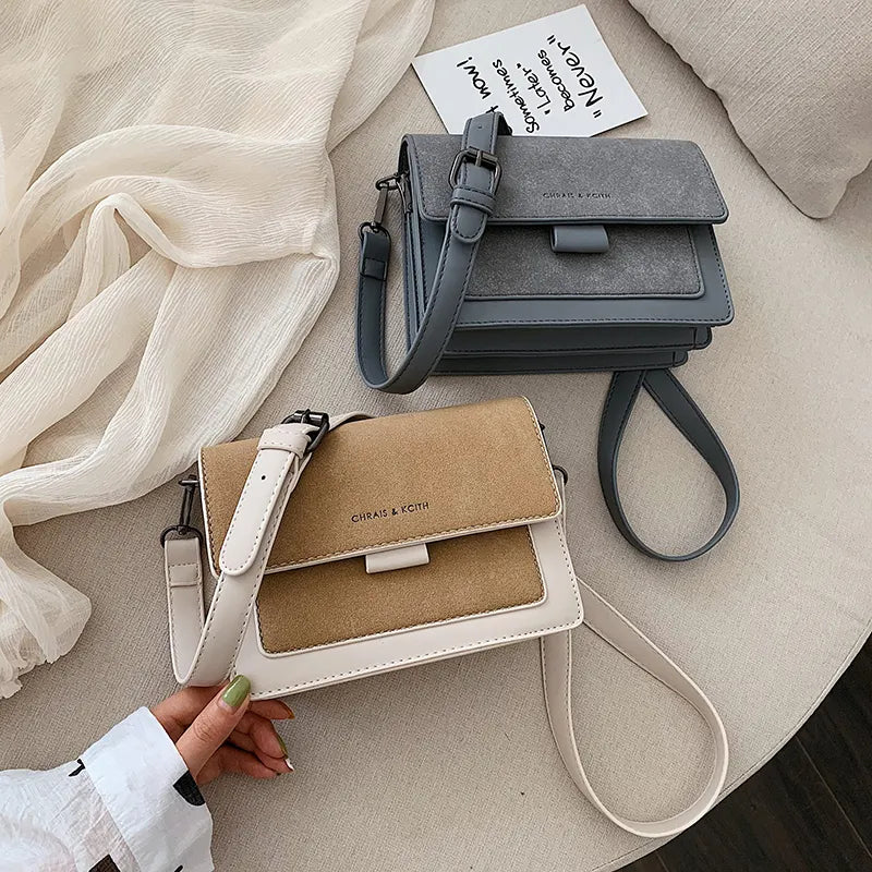 Annelie - Moderigtig skuldertaske med multi-lomme design