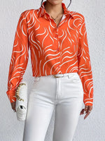 Orange bluse med abstrakt print til kvinder