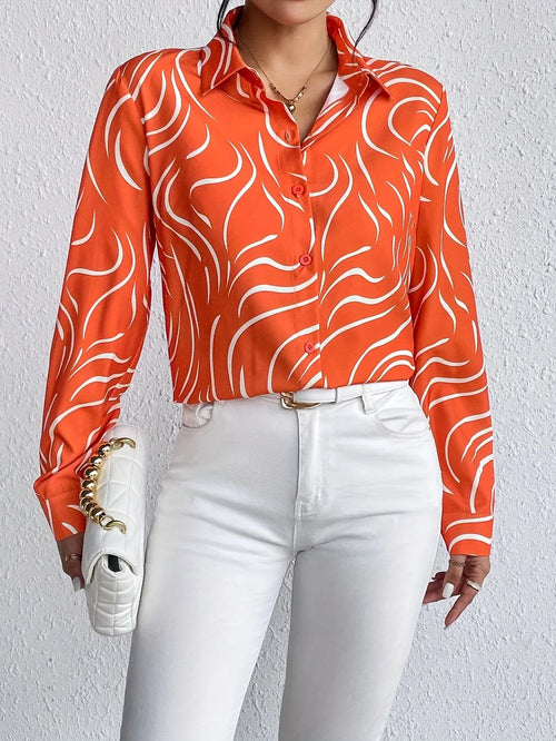 Orange bluse med abstrakt print til kvinder