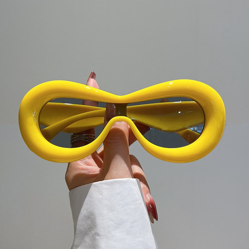Futuristiske ovale solbriller med et slankt design - Herta