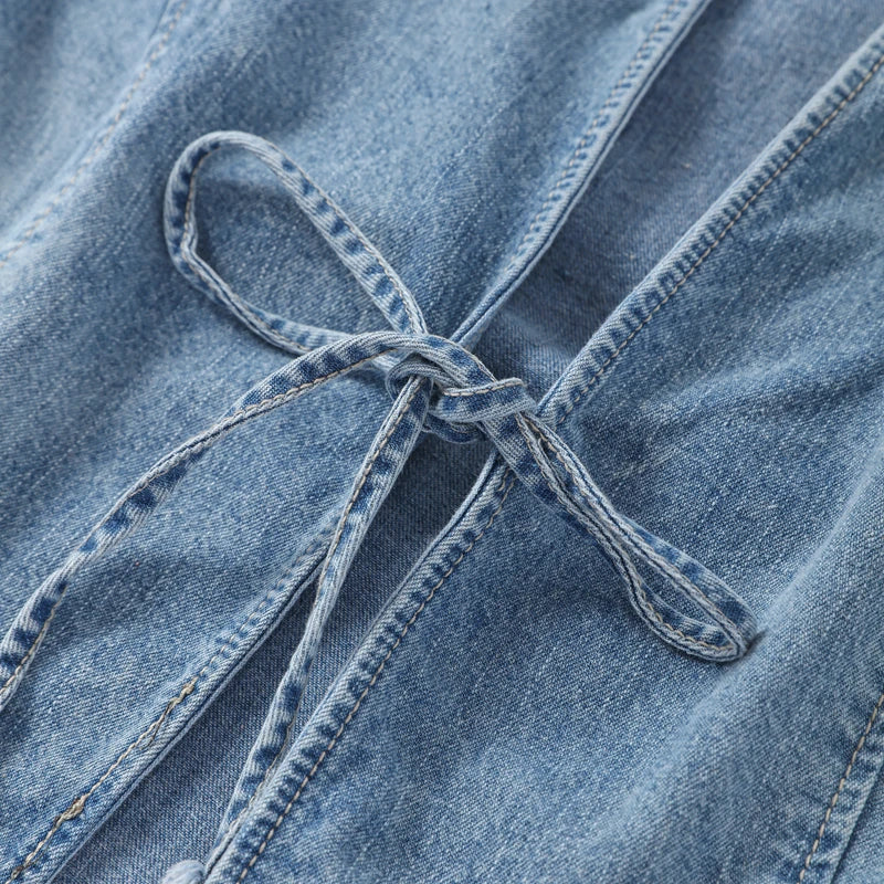 Dametop med lange ærmer og smal denim