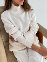 Strikket rullekravesweater til kvinder