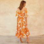 Bianca - Livlig off-the-shoulder midikjole med et geometrisk mønster