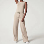 Mia - ærmeløs jumpsuit med brede ben og bindebånd i taljen