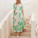 Nina - midikjole med blomsterprint med pufærmer