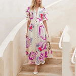 Nina - midikjole med blomsterprint med pufærmer
