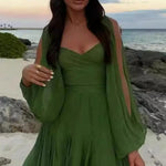 Elena - Chiffon minikjole med V-udskæring og gennemsigtige ærmer