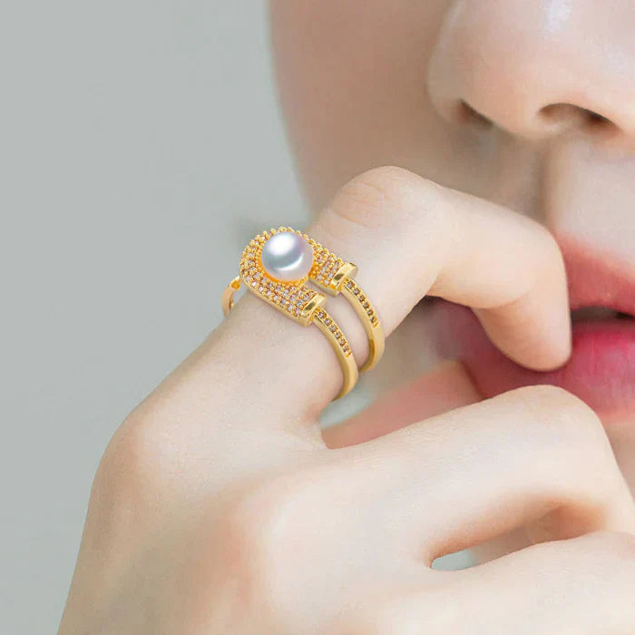 Cassia - split band ring med central perle og pavé indstilling