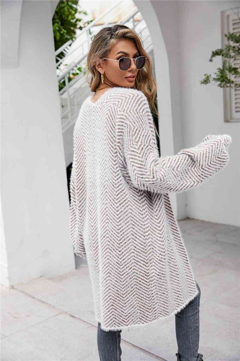 Cardigan med sildebensmønster og vamset pels