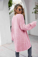Cardigan med sildebensmønster og vamset pels