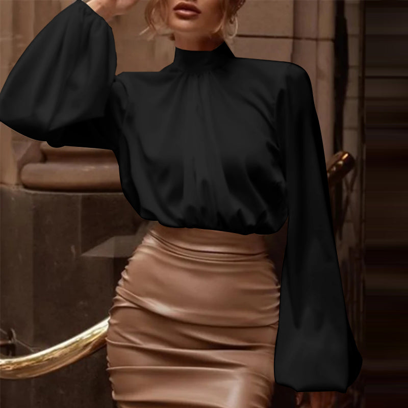 Elegant satinbluse med høj krave og pufærmer