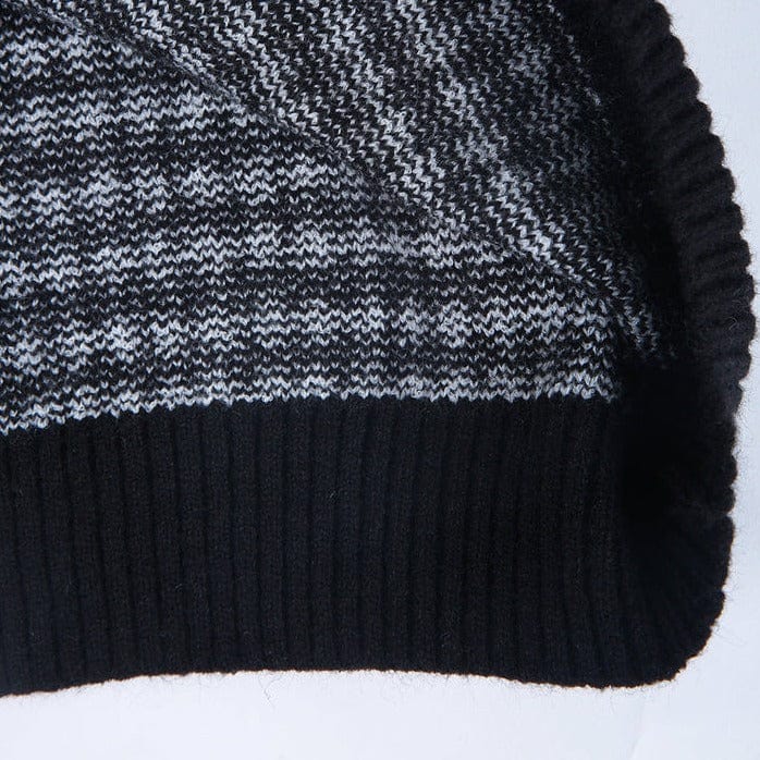 Mia - Elegant sweater med sort og hvidt ternet mønster